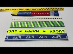 Mejora tu con etiquetas de prendas personalizadas, técnicas de telar de calada y etiquetas bordadas