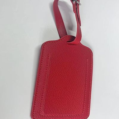 Bolso rojo haciendo accesorios etiqueta de cuero personalizada