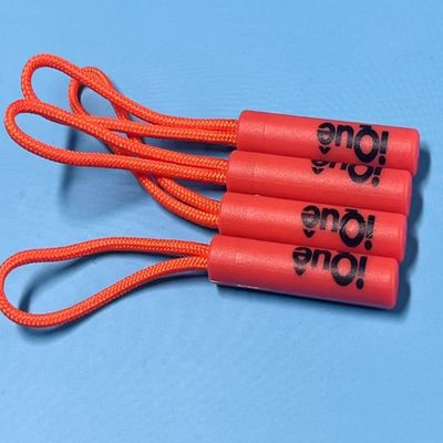 Inmune de plástico de color naranja con cuerda de balanceo tirador de cremallera para ropa