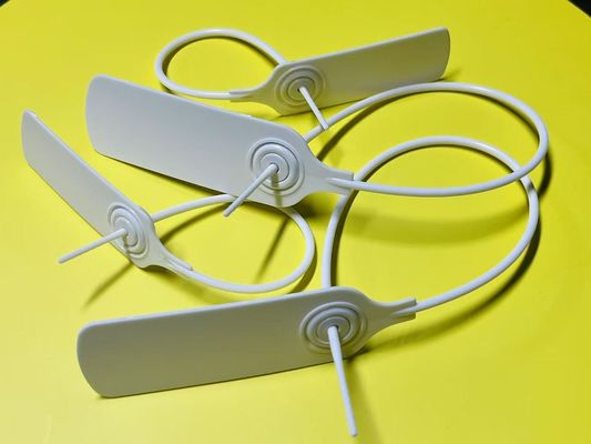 Etiqueta de seguridad de tela de plástico blanco a granel en ropa rectángulo