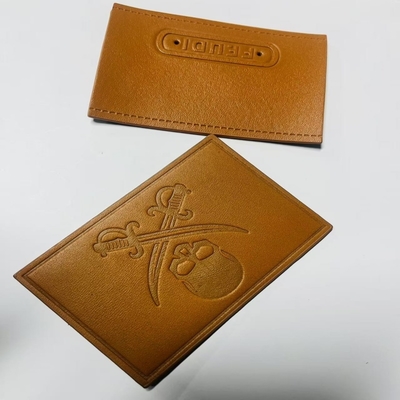 Etiquetas personalizadas de cuero cosidas en el cierre Tipo personalizado para requisitos individuales